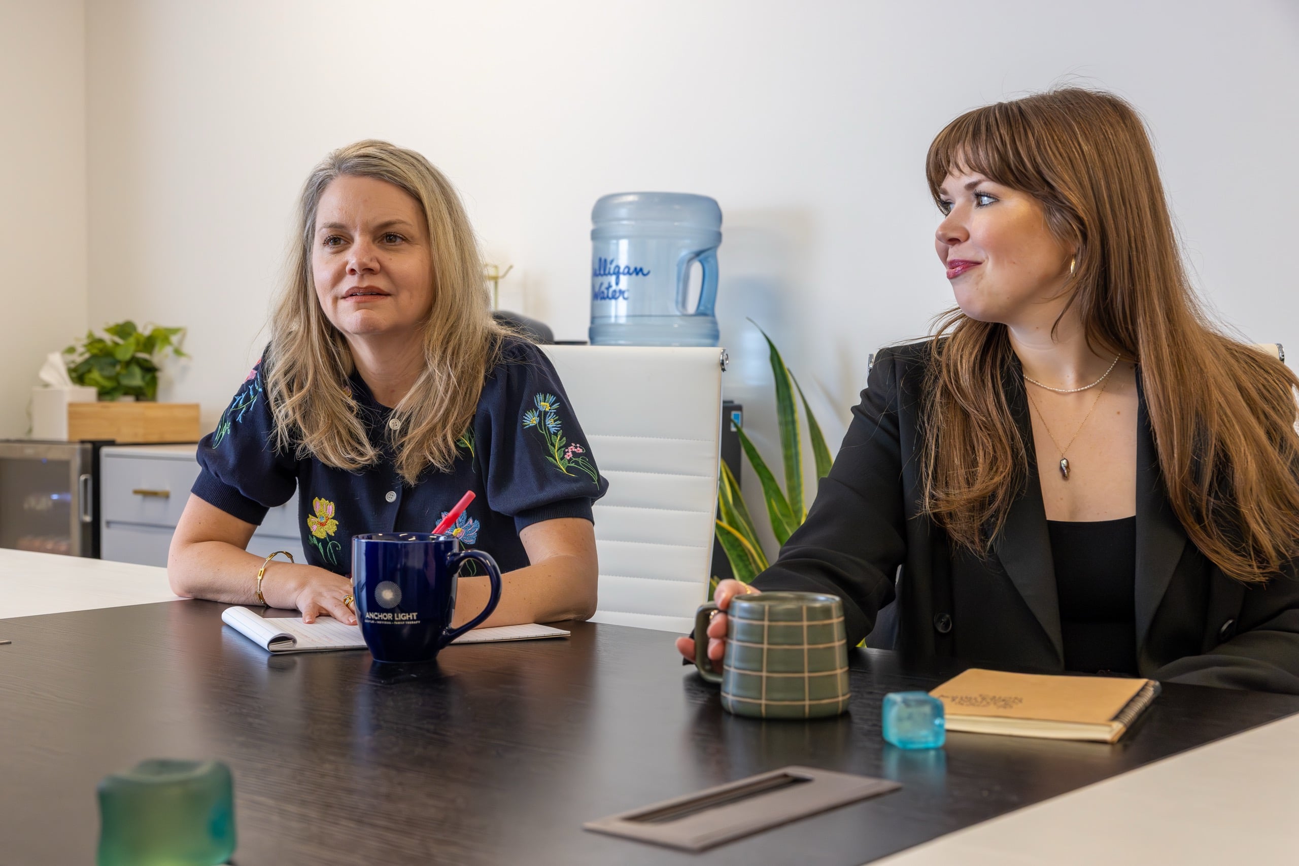 AnchorLight therapists in conversation at the Seattle office