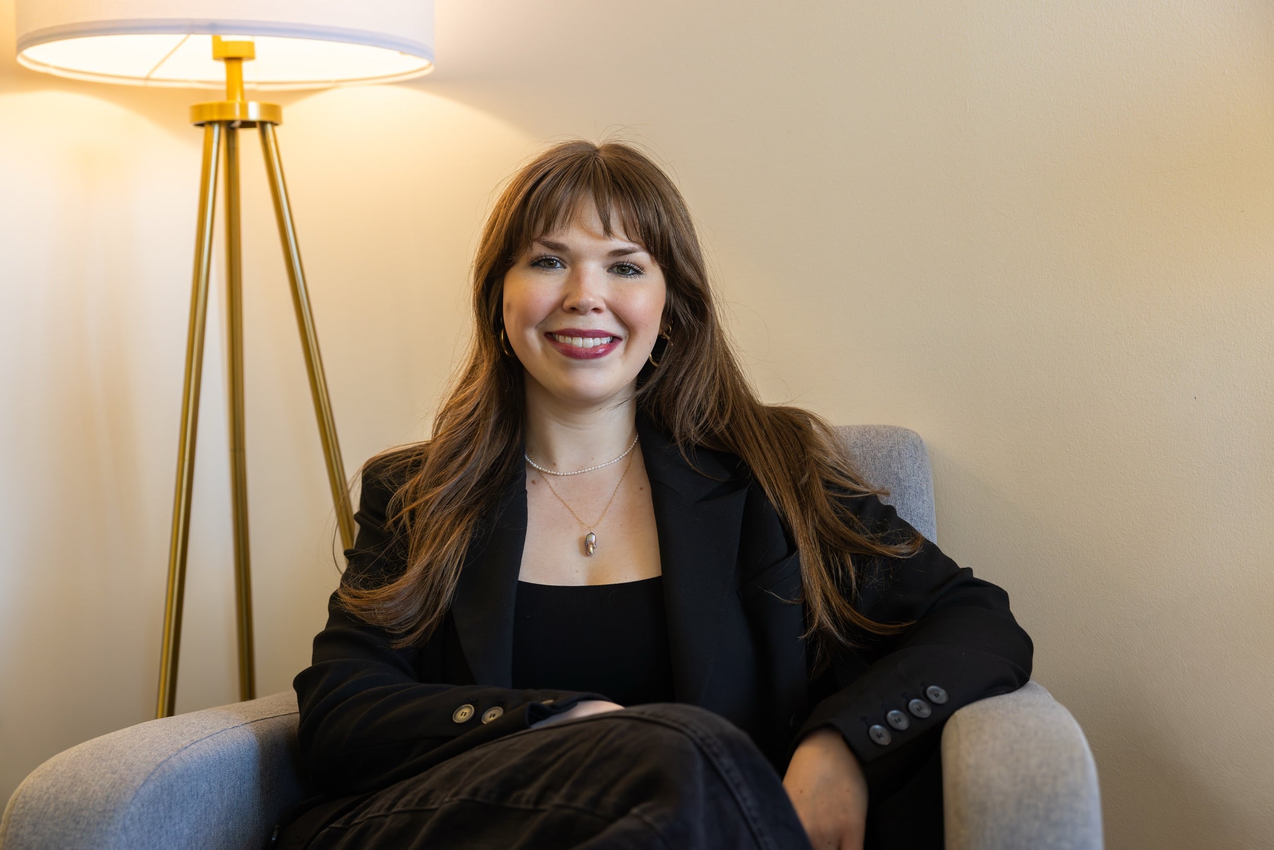 Therapist Carolyn Todd seated in an Anchor Light therapy office