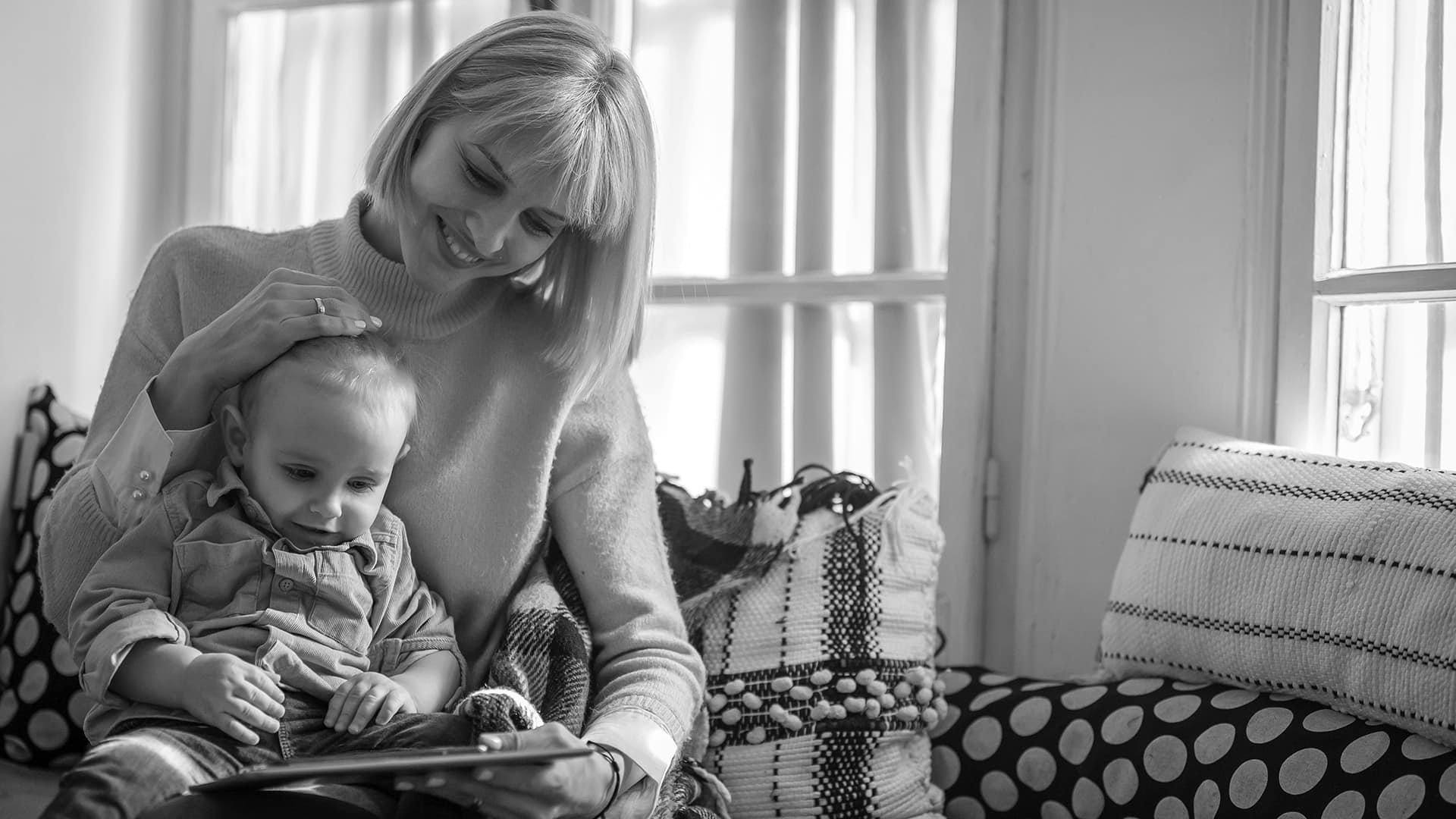 Mother and son reading together